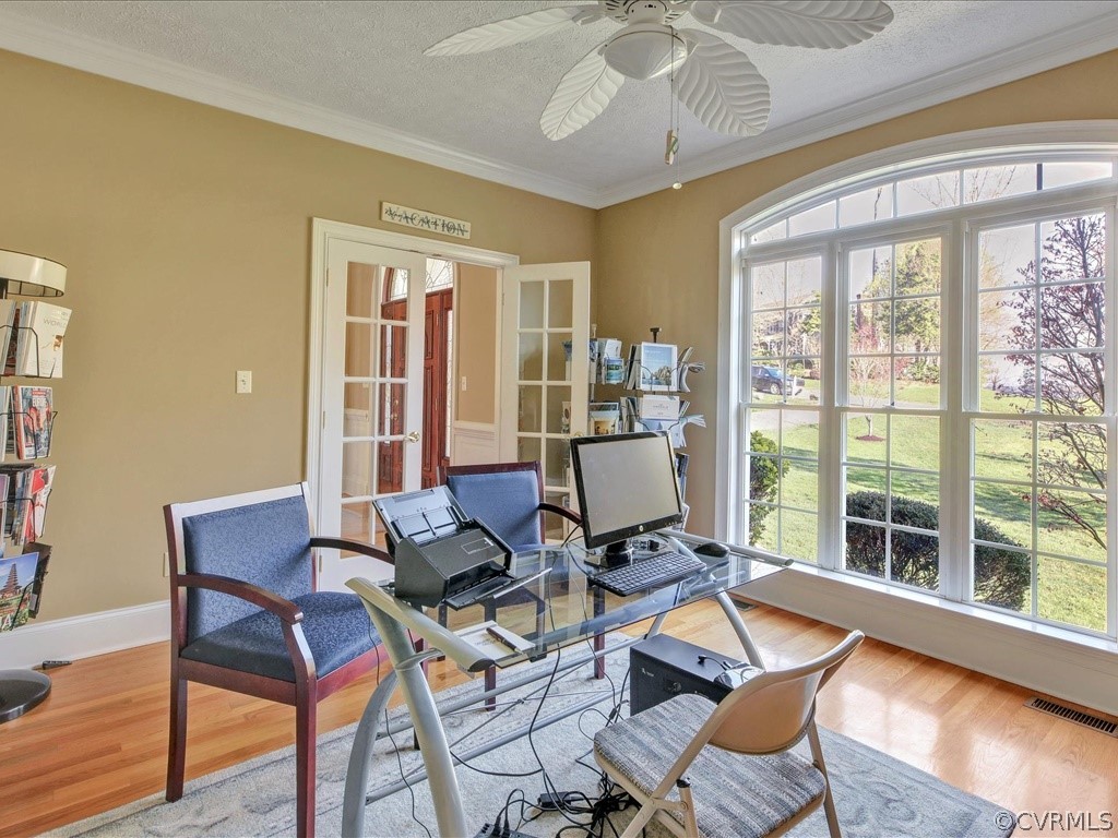 13711 Beechwood Point Road Midlothian, VA 23112 - Photo 6 of 49 a view of a dining room with furniture wooden floor and a chandelier