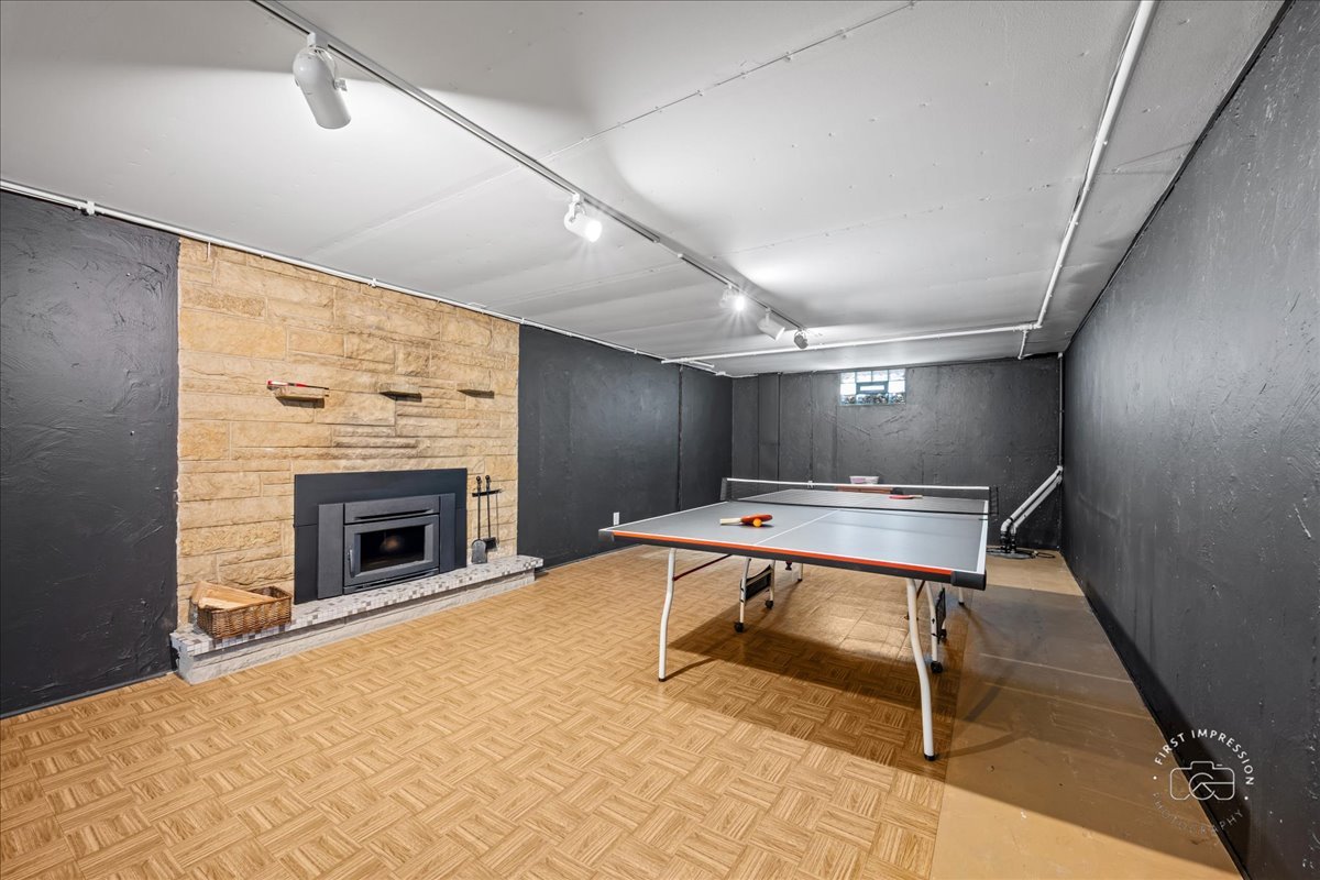 337 Republic Road Batavia, IL 60510 - Photo 15 of 22 a room with furniture pool table fireplace and windows