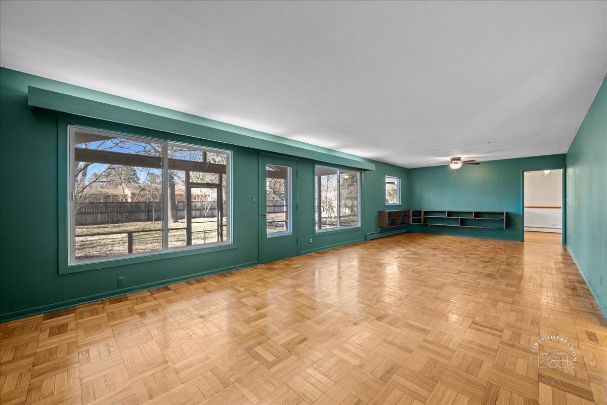 337 Republic Road Batavia, IL 60510 - Photo 7 of 22 a view of an empty room with a window and a kitchen