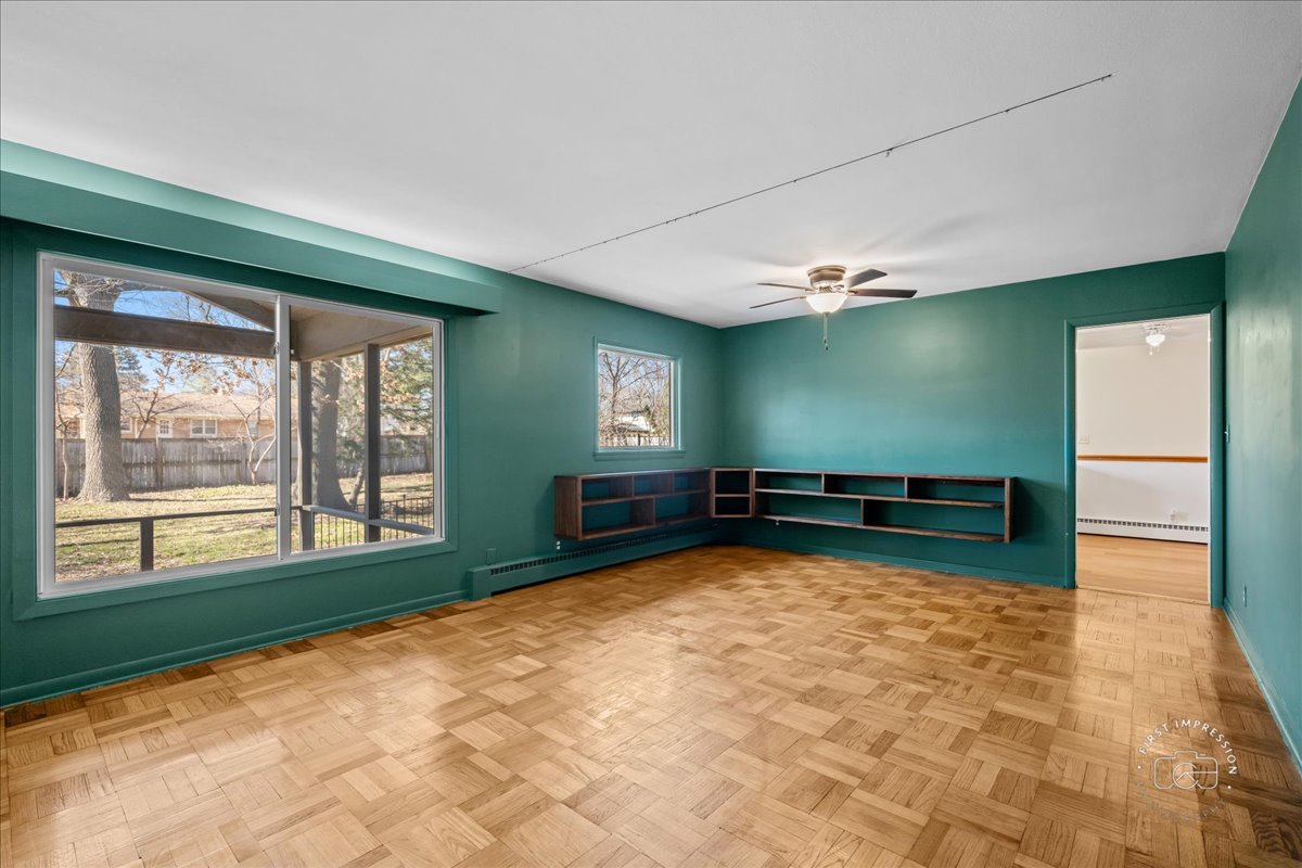 337 Republic Road Batavia, IL 60510 - Photo 8 of 22 a view of a livingroom with an empty space and a window