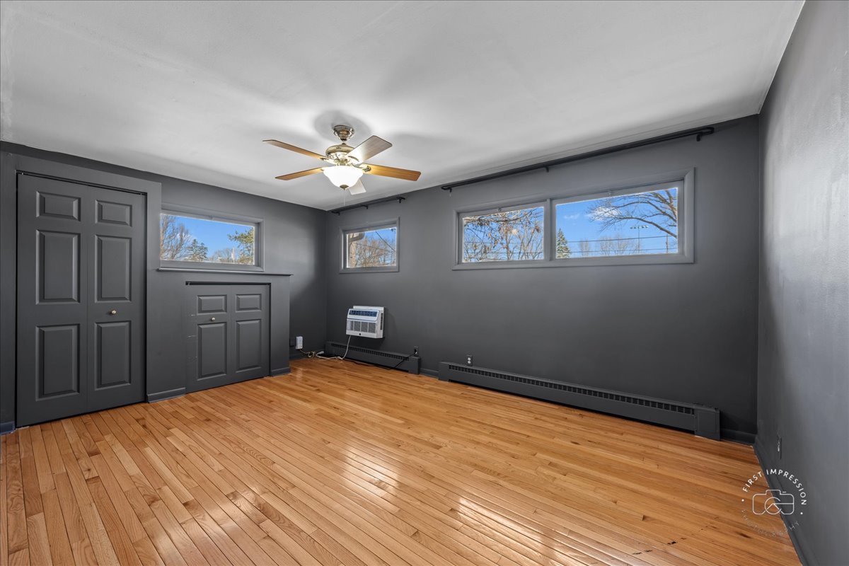 337 Republic Road Batavia, IL 60510 - Photo 9 of 22 a view of an empty room with a window