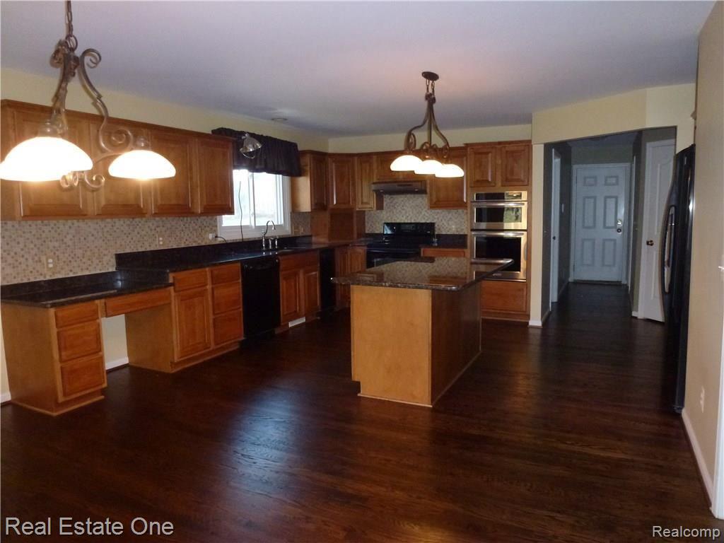 4139 Barnes Court Rochester, MI 48306 - Photo 14 of 29 Beautiful Kitchen with Wood Floors