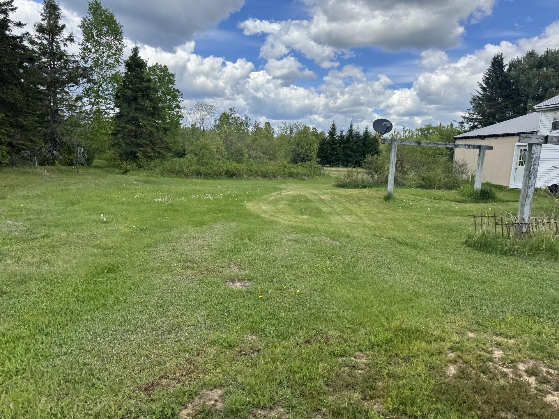328 Clark Road Merrill, ME 04780 - Photo 21 of 55 Camp Yard (328 Clark Road)