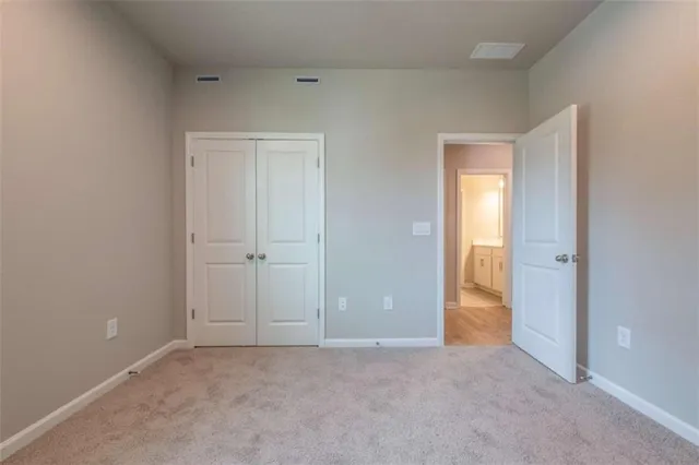 wooden floor and closet in a room