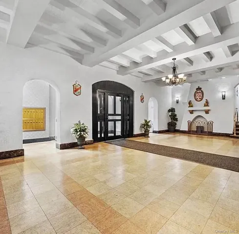 a view of a livingroom with a fireplace and furniture