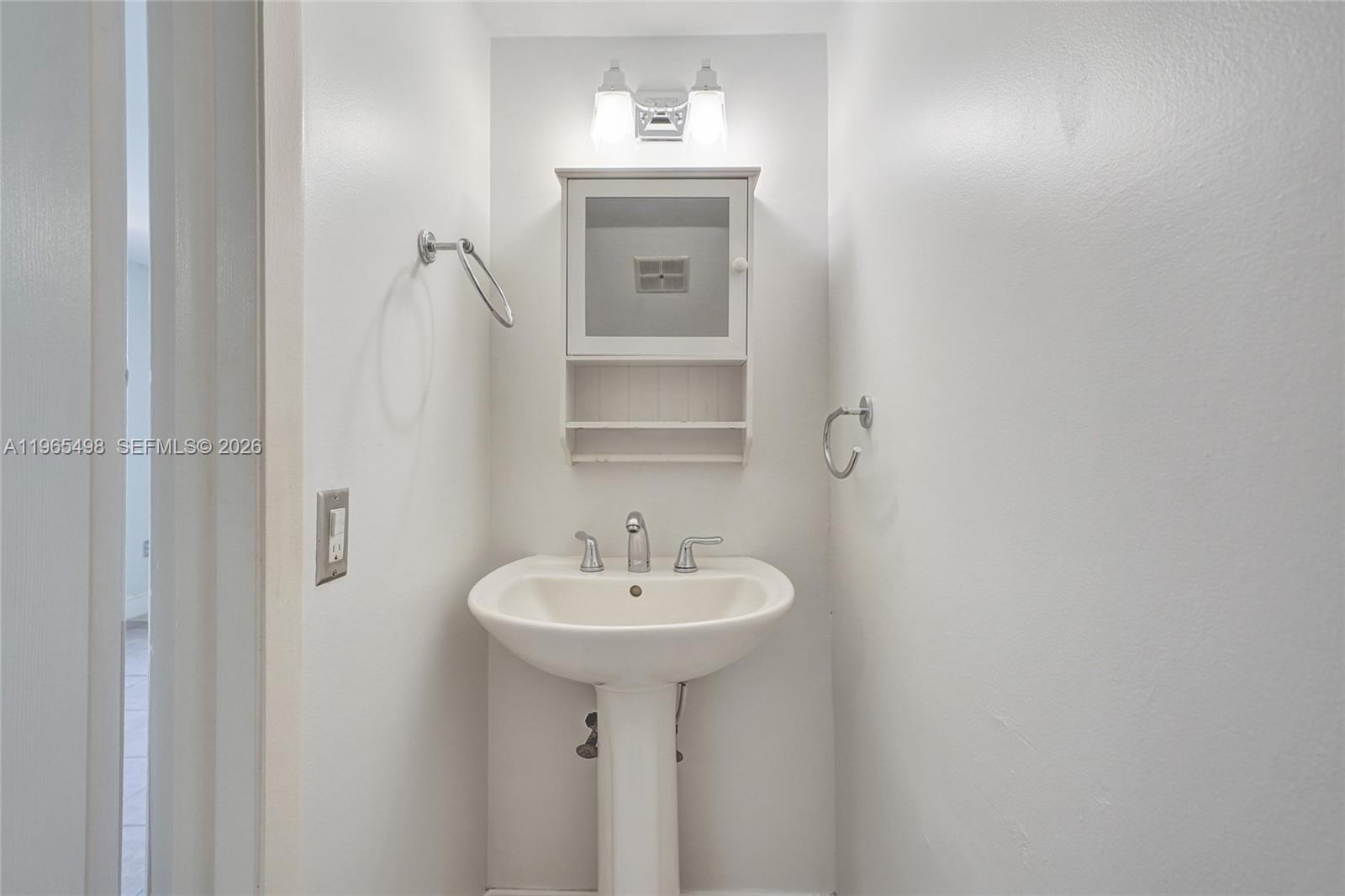 4600 Southwest 67th Avenue, Unit 245 Miami, FL 33155 - Photo 15 of 51 First Floor 1/2 bath.