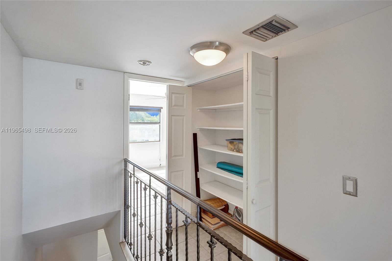 4600 Southwest 67th Avenue, Unit 245 Miami, FL 33155 - Photo 19 of 51 2nd floor landing boasts a huge utility closet. Can never have too many closets.