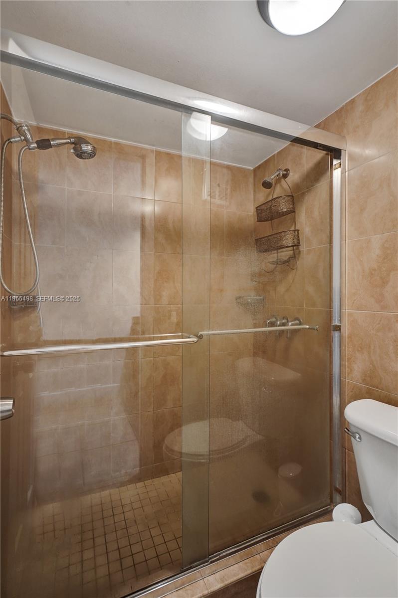 4600 Southwest 67th Avenue, Unit 245 Miami, FL 33155 - Photo 28 of 51 huge shower with sparkling glass door