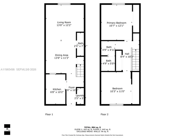 a kitchen with a sink a stove and a refrigerator