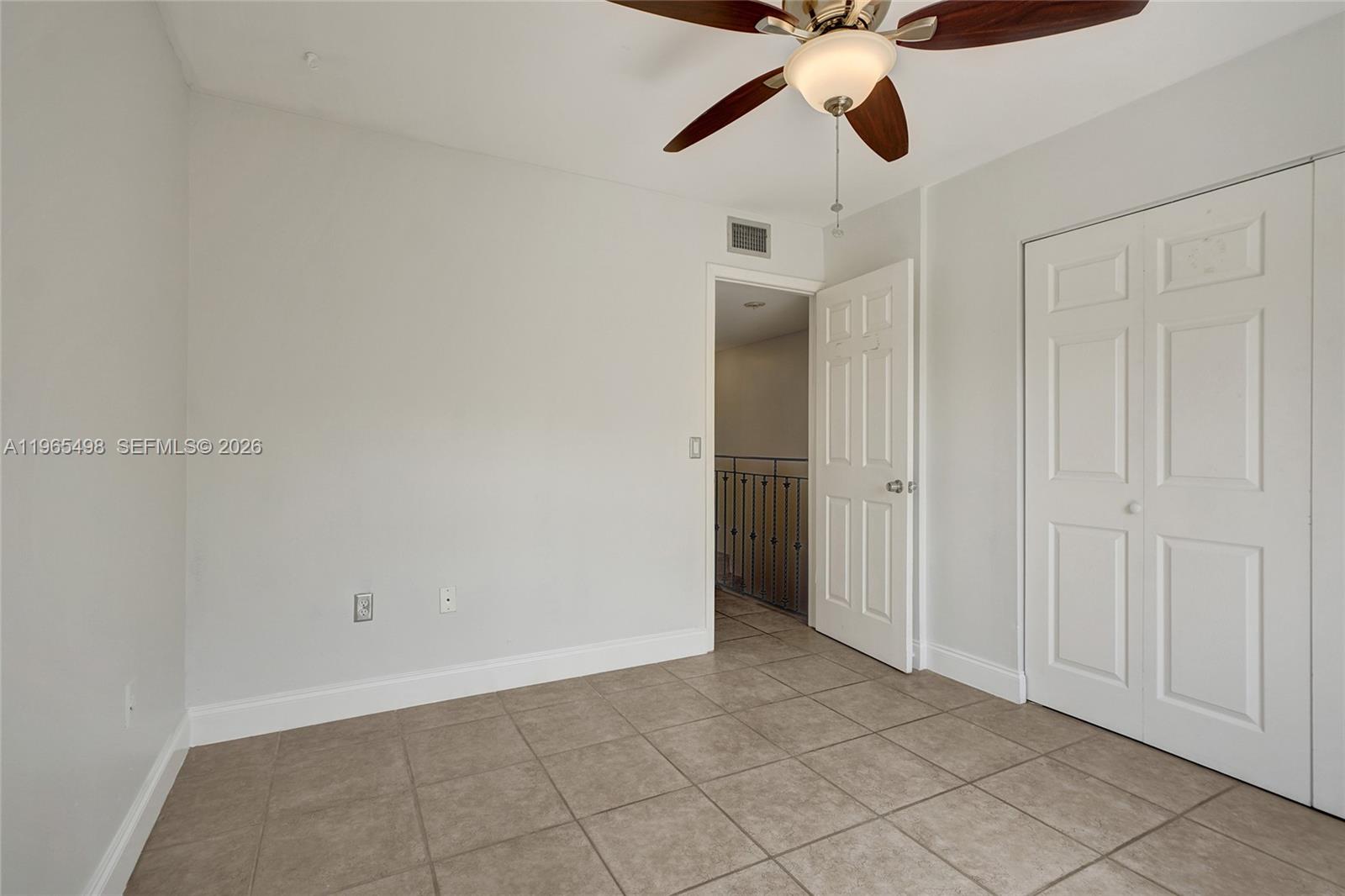 4600 Southwest 67th Avenue, Unit 245 Miami, FL 33155 - Photo 31 of 51 Bedroom #2 of 2 also boasts a rare ceiling fan and ceiling light. Like the entire condo, this bedroom is also freshly painted.