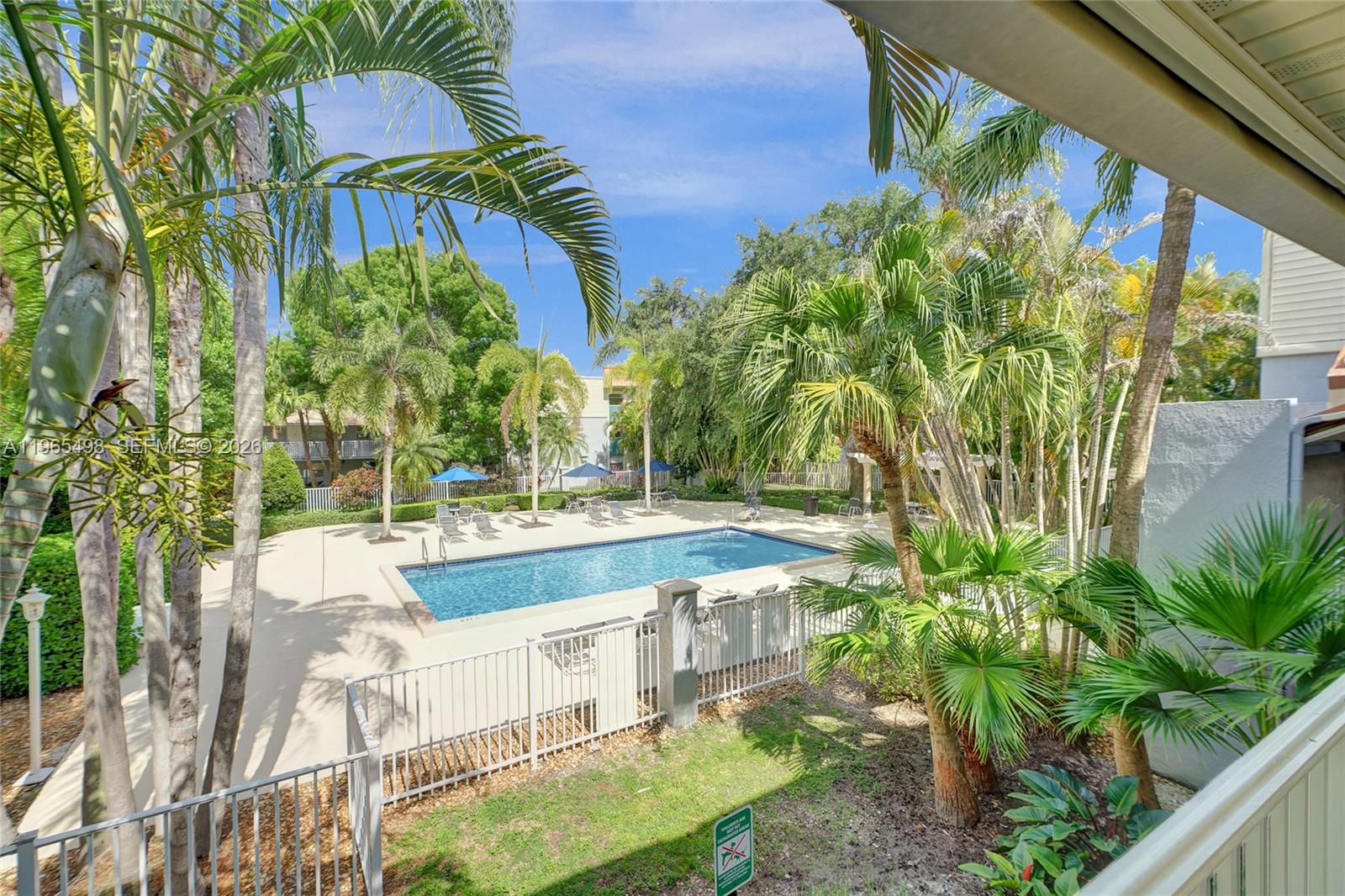 4600 Southwest 67th Avenue, Unit 245 Miami, FL 33155 - Photo 38 of 51 Sparkling pool area features lots of lounge chairs, gazebo with dinng table and chairs, and a grill for those delicious BBQ's. Notice the lush landscaping and meticulously maintained grounds, too.