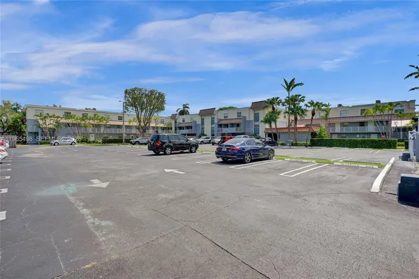 a view of street with tall buildings