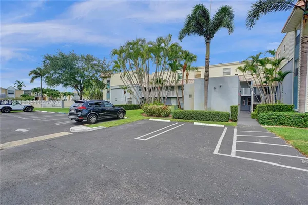 a view of swimming pool with outdoor seating