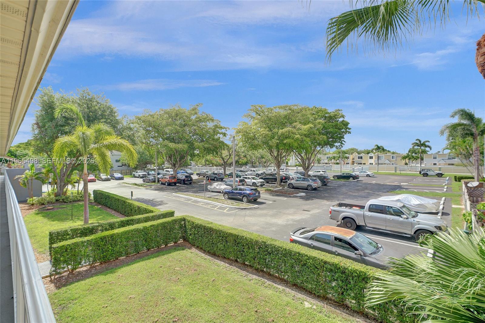 4600 Southwest 67th Avenue, Unit 245 Miami, FL 33155 - Photo 47 of 51 2nd of 2 parking lots as viewed from breezy 2nd floor walkways