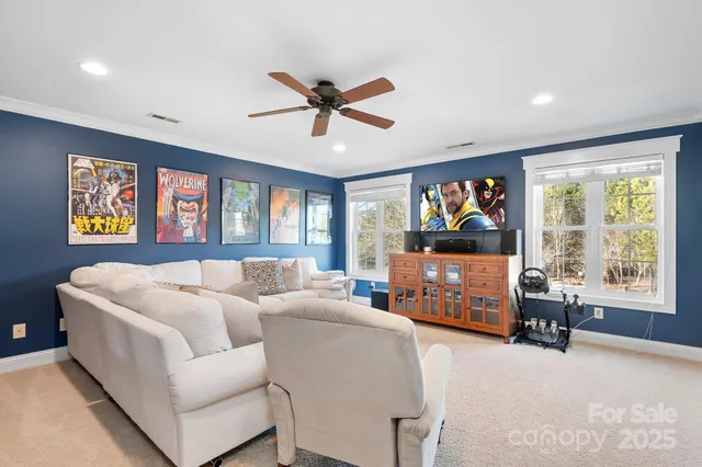 a bed room with a bed and a large window