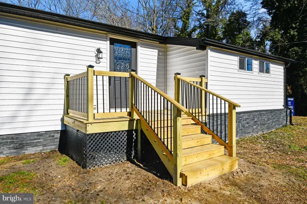 a view of backyard space and tree