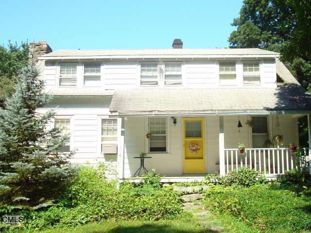 177 Everett Road Easton, CT 06612 - Photo 1 of 1 a front view of a house with a yard