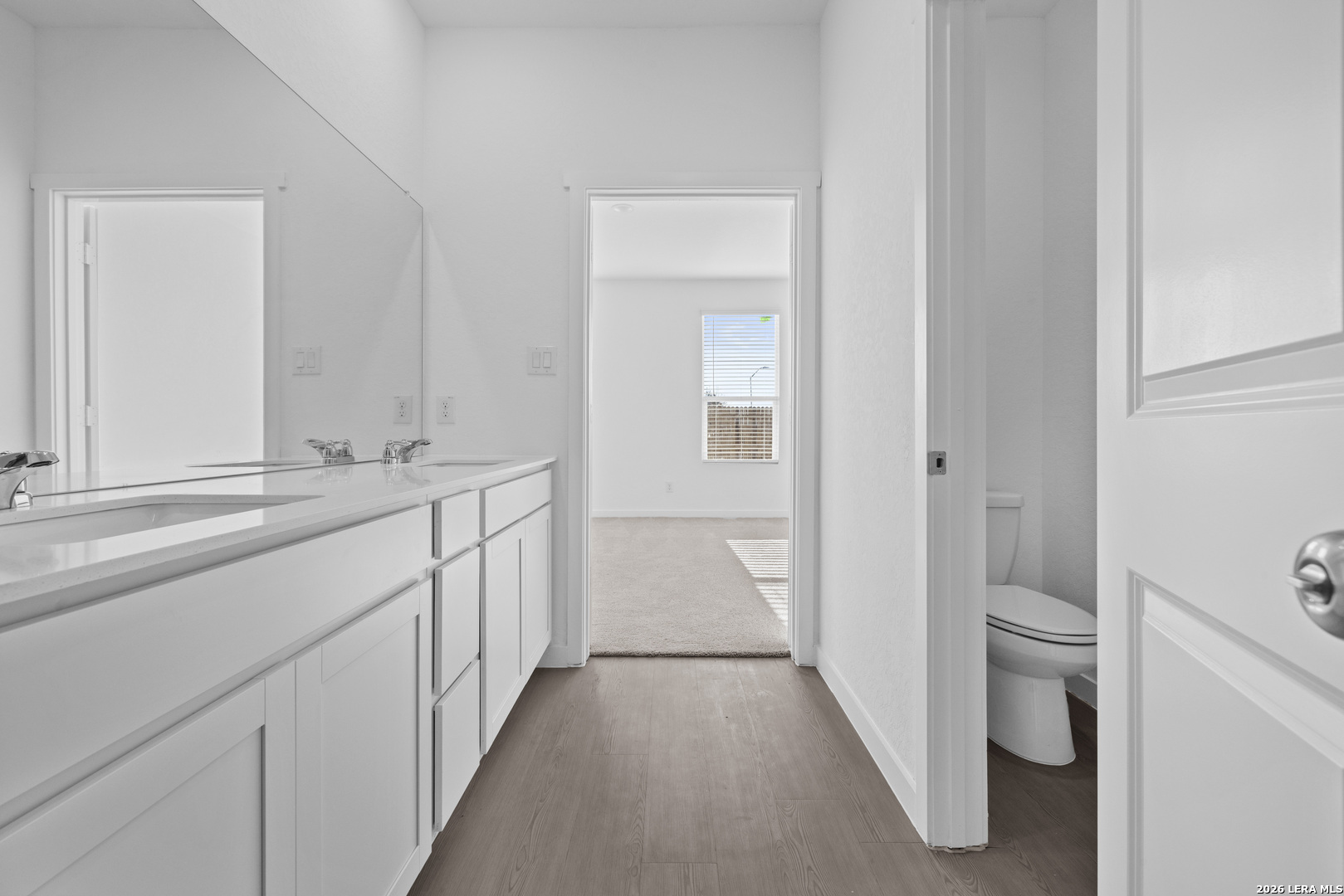 1895 Nuthatch Ridge New Braunfels, TX 78130 - Photo 11 of 20 a bathroom with a sink and a toilet