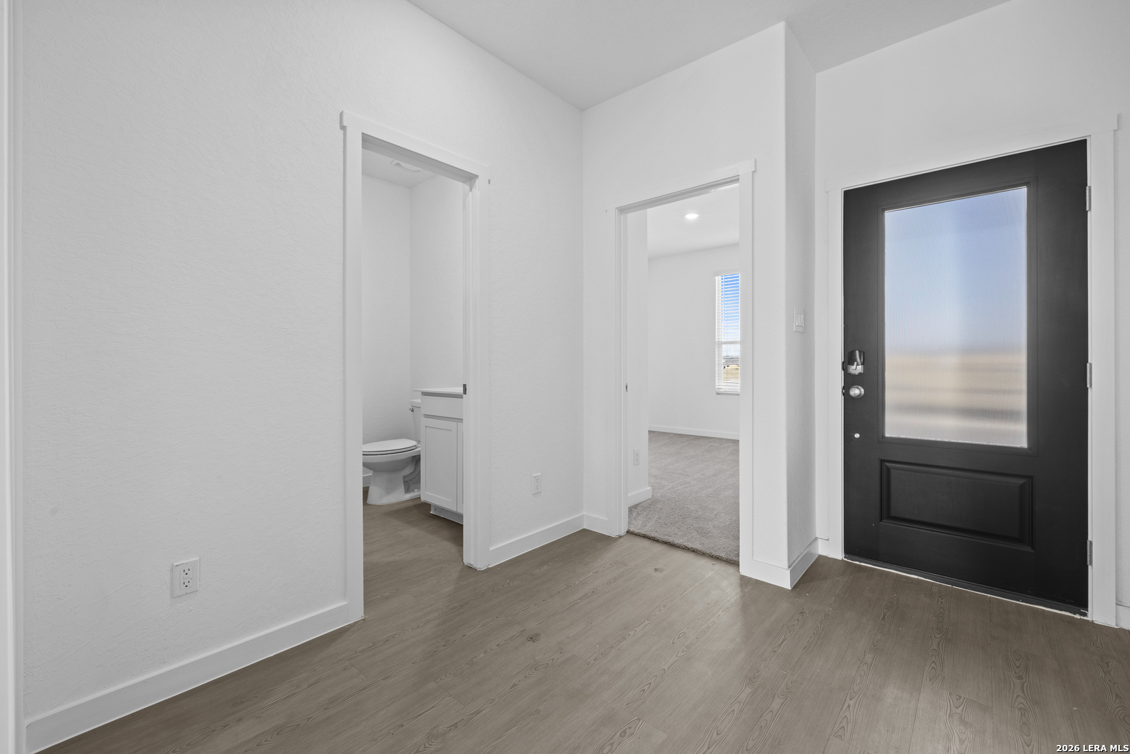 1895 Nuthatch Ridge New Braunfels, TX 78130 - Photo 12 of 20 wooden floor and closet in a room