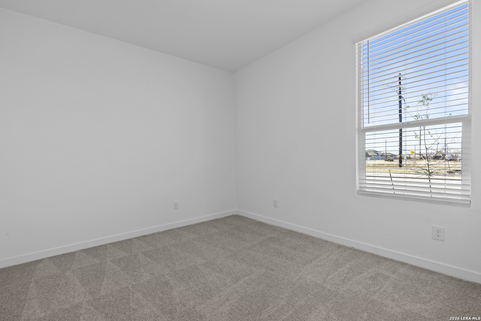 1895 Nuthatch Ridge New Braunfels, TX 78130 - Photo 13 of 20 an empty room with a window