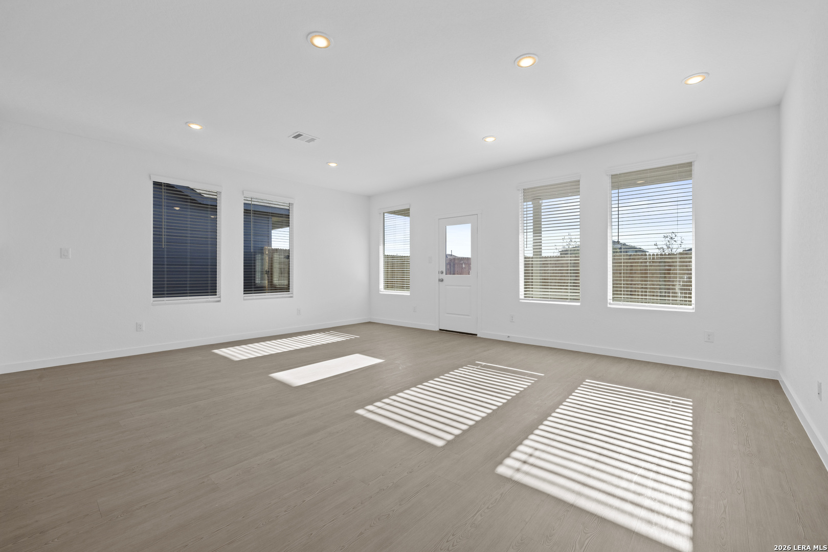 1895 Nuthatch Ridge New Braunfels, TX 78130 - Photo 5 of 20 a view of an empty room with windows