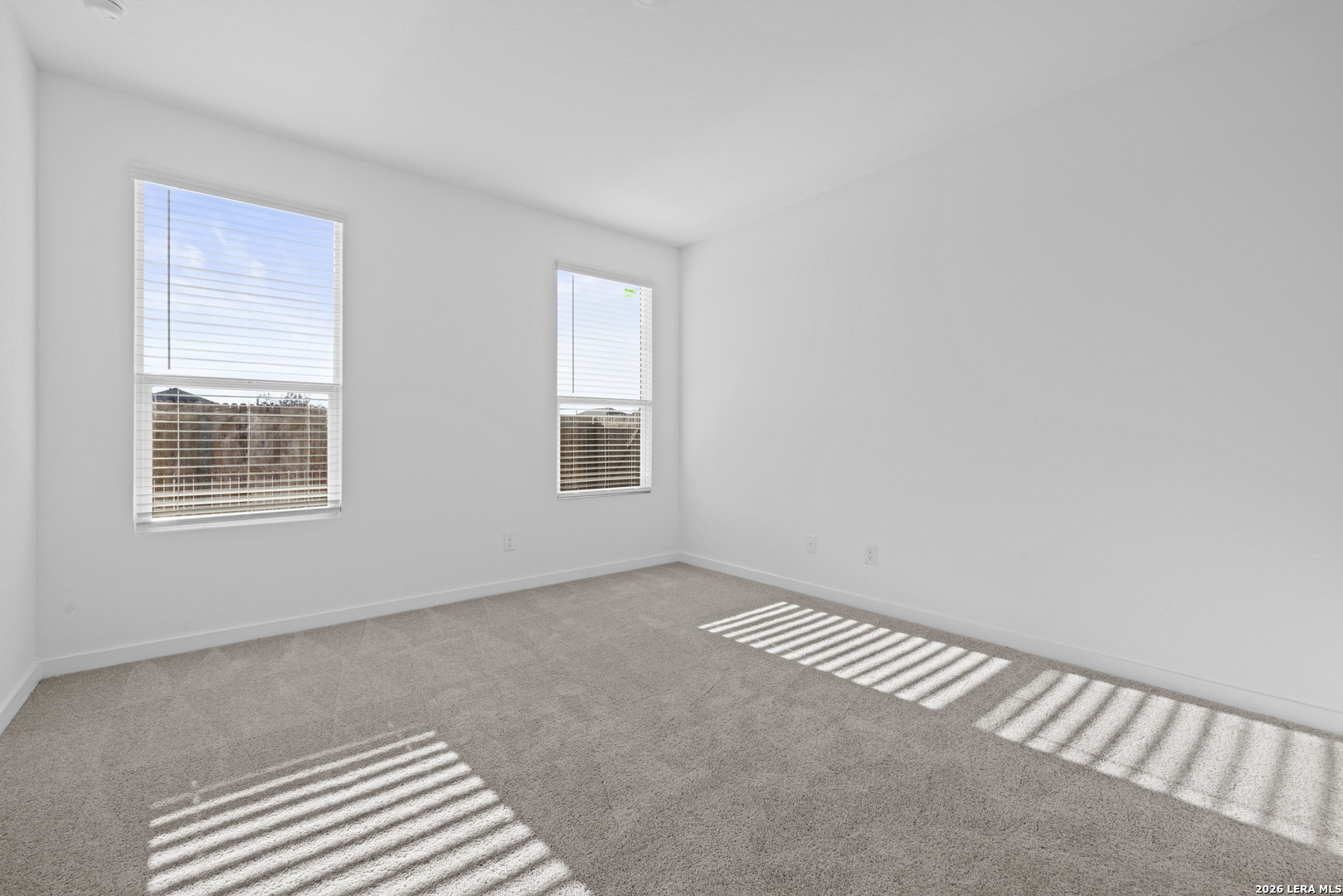 1895 Nuthatch Ridge New Braunfels, TX 78130 - Photo 8 of 20 an empty room with windows