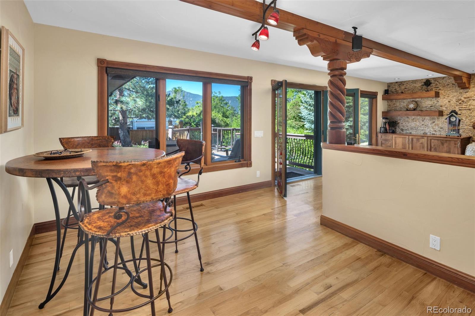 3816 Cloverleaf Drive Boulder, CO 80304 - Photo 13 of 35 a dining room with furniture window wooden floor