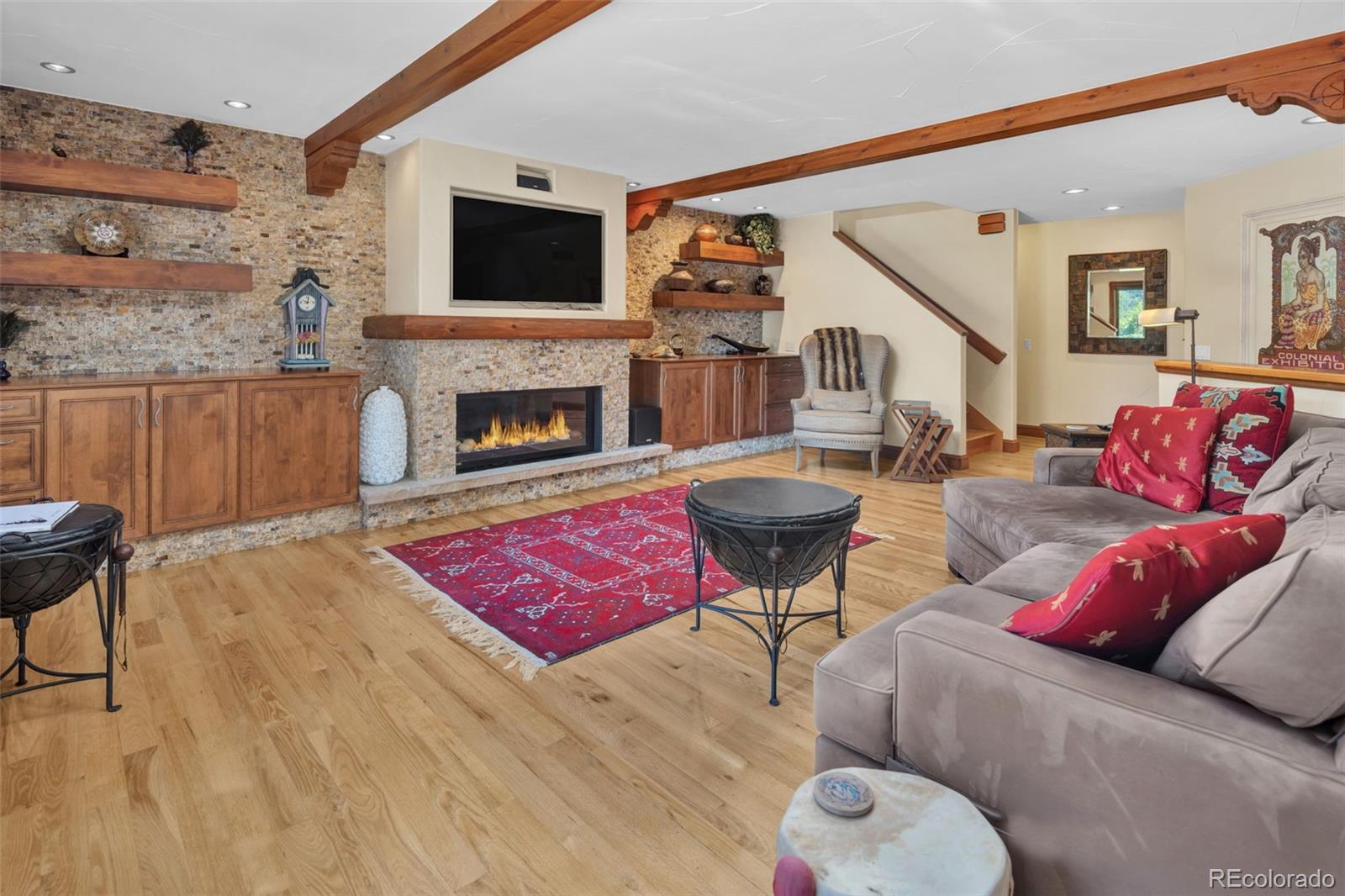 3816 Cloverleaf Drive Boulder, CO 80304 - Photo 15 of 35 a living room with furniture and a fireplace