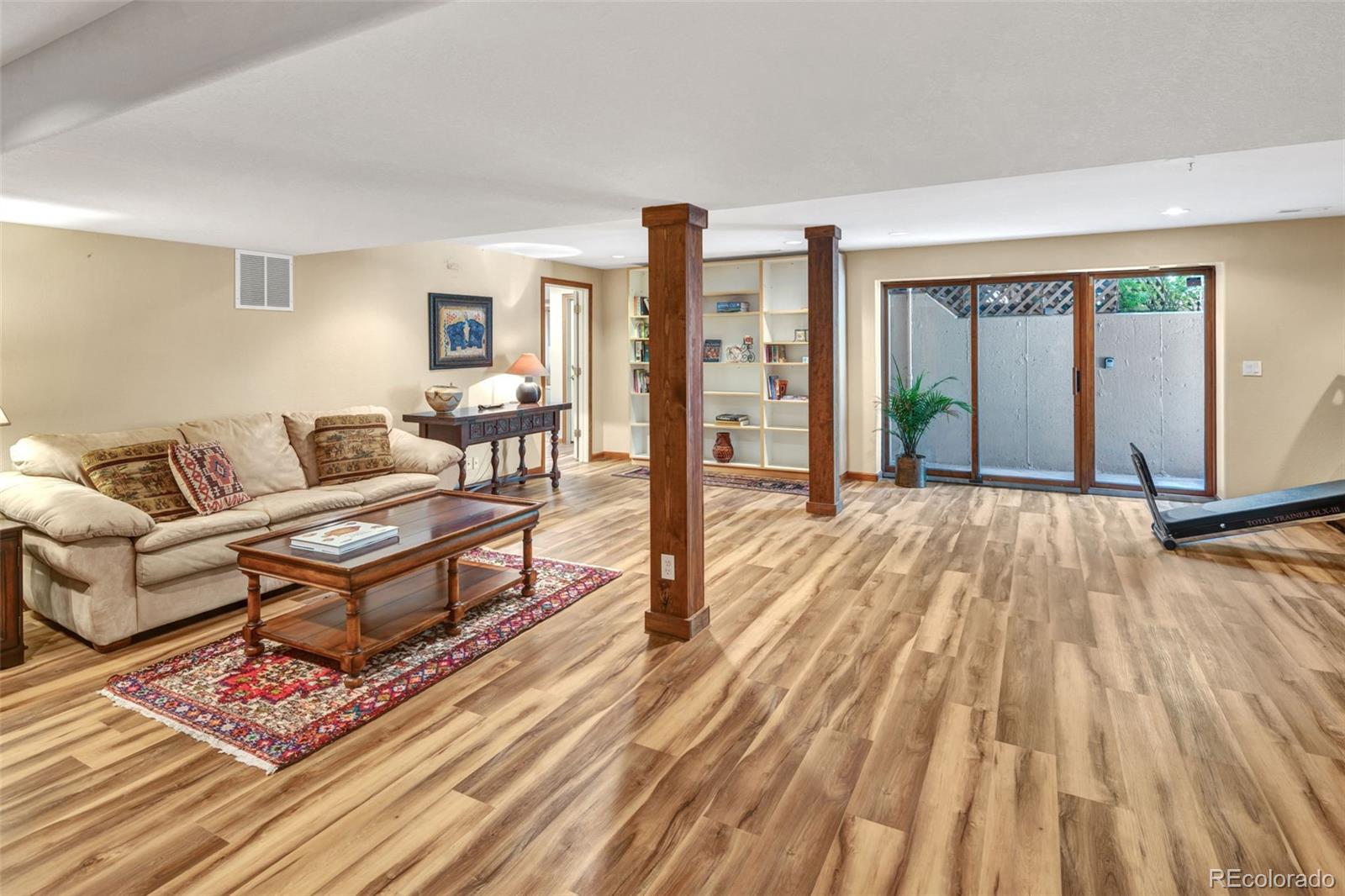 3816 Cloverleaf Drive Boulder, CO 80304 - Photo 23 of 35 a living room with furniture and wooden floor