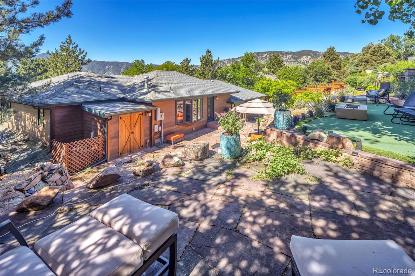 3816 Cloverleaf Drive Boulder, CO 80304 - Photo 29 of 35 a front view of a house with a yard