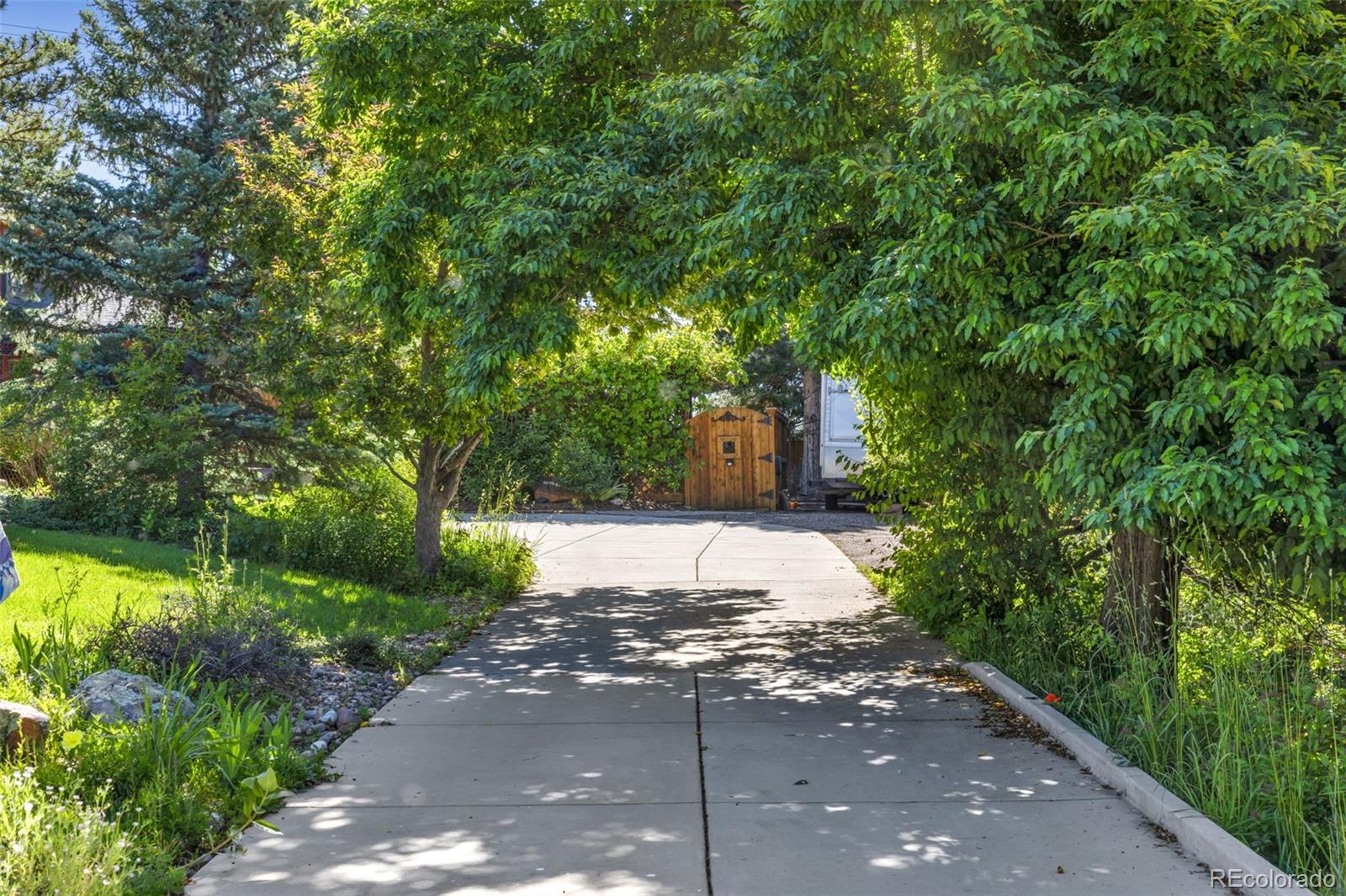 3816 Cloverleaf Drive Boulder, CO 80304 - Photo 7 of 35 a view of a street with plants and trees