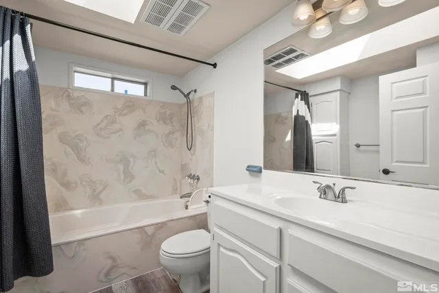 a view of swimming pool with outdoor seating