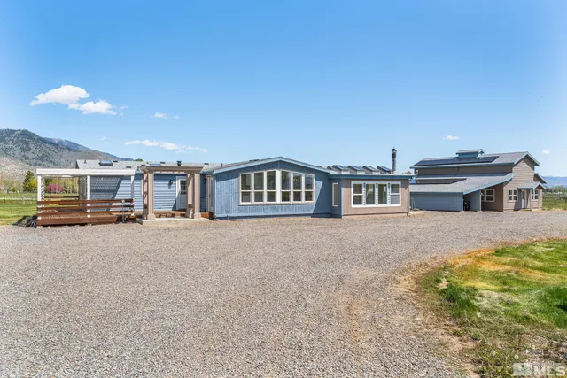 a view of a house with a ocean view