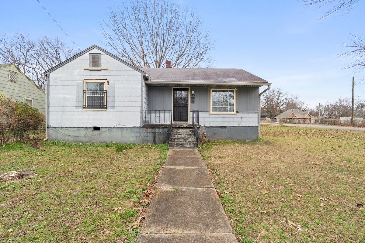 1012 Newell Road Memphis, TN 38111 - Photo 1 of 16 Bungalow with a front lawn and covered porch