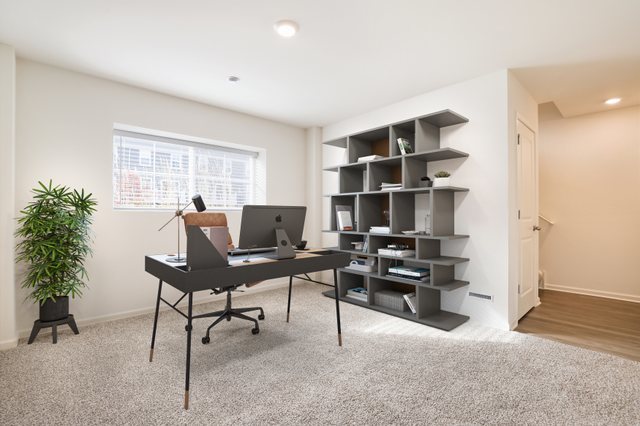 8746 Clover Lane St. John, IN 46373 - Photo 18 of 31 a work room with furniture and a potted plant