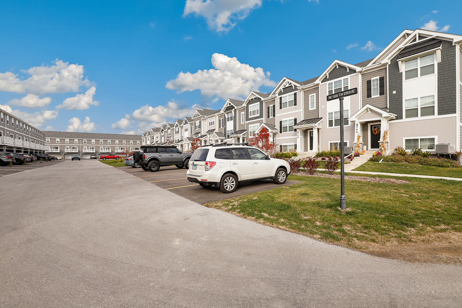 8746 Clover Lane St. John, IN 46373 - Photo 3 of 31 a white house covered with tall trees
