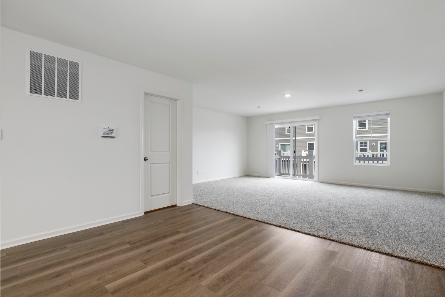 8746 Clover Lane St. John, IN 46373 - Photo 6 of 31 a big room with wooden floor and windows