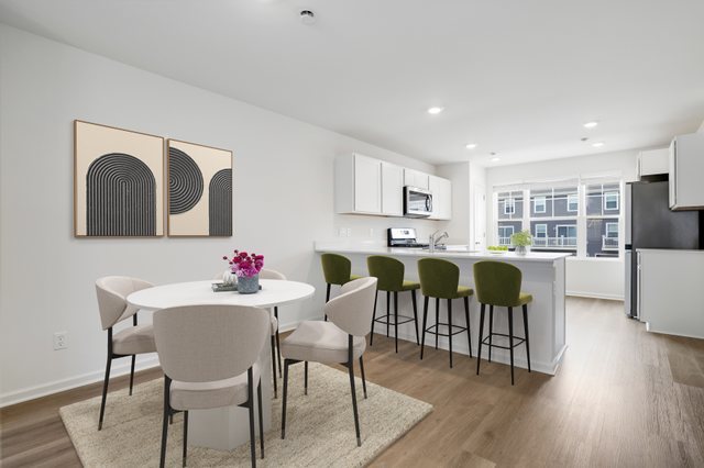 8746 Clover Lane St. John, IN 46373 - Photo 9 of 31 a living room with furniture and kitchen view