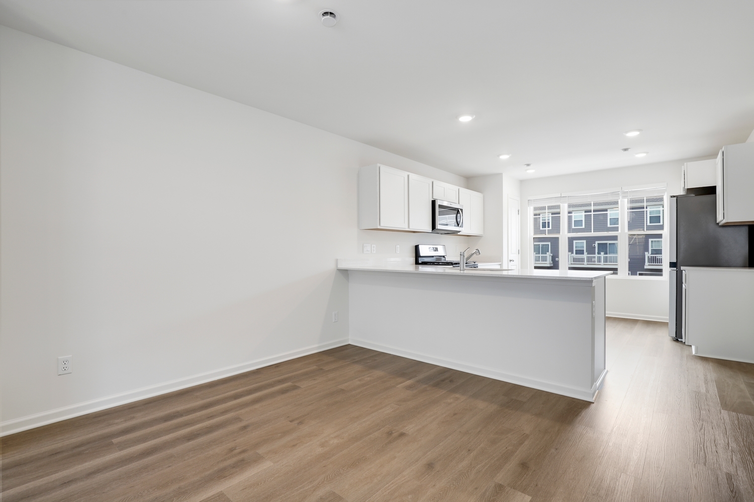 8746 Clover Lane St. John, IN 46373 - Photo 10 of 31 a view of kitchen with wooden floor and electronic appliances