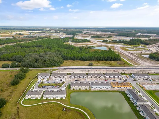 a view of a swimming pool with an ocean view