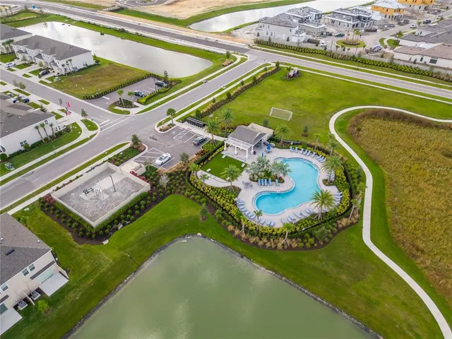 an aerial view of a house with a ocean view