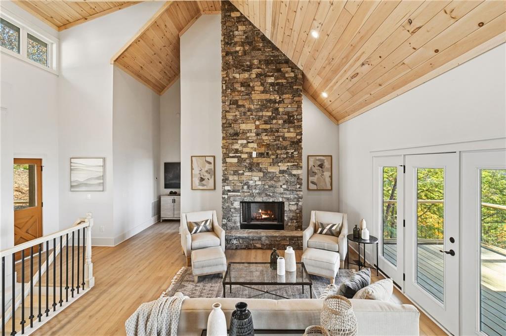 5388 Monument Road Jasper, GA 30143 - Photo 13 of 45 a living room with furniture and a fireplace