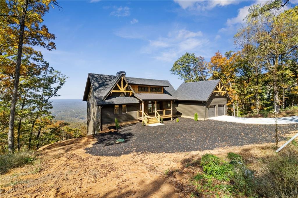 5388 Monument Road Jasper, GA 30143 - Photo 29 of 45 a view of a house with a yard