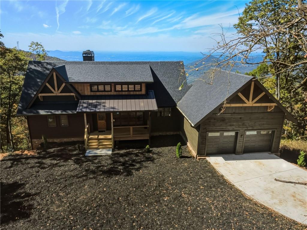 5388 Monument Road Jasper, GA 30143 - Photo 33 of 45 a front view of a house with a garage