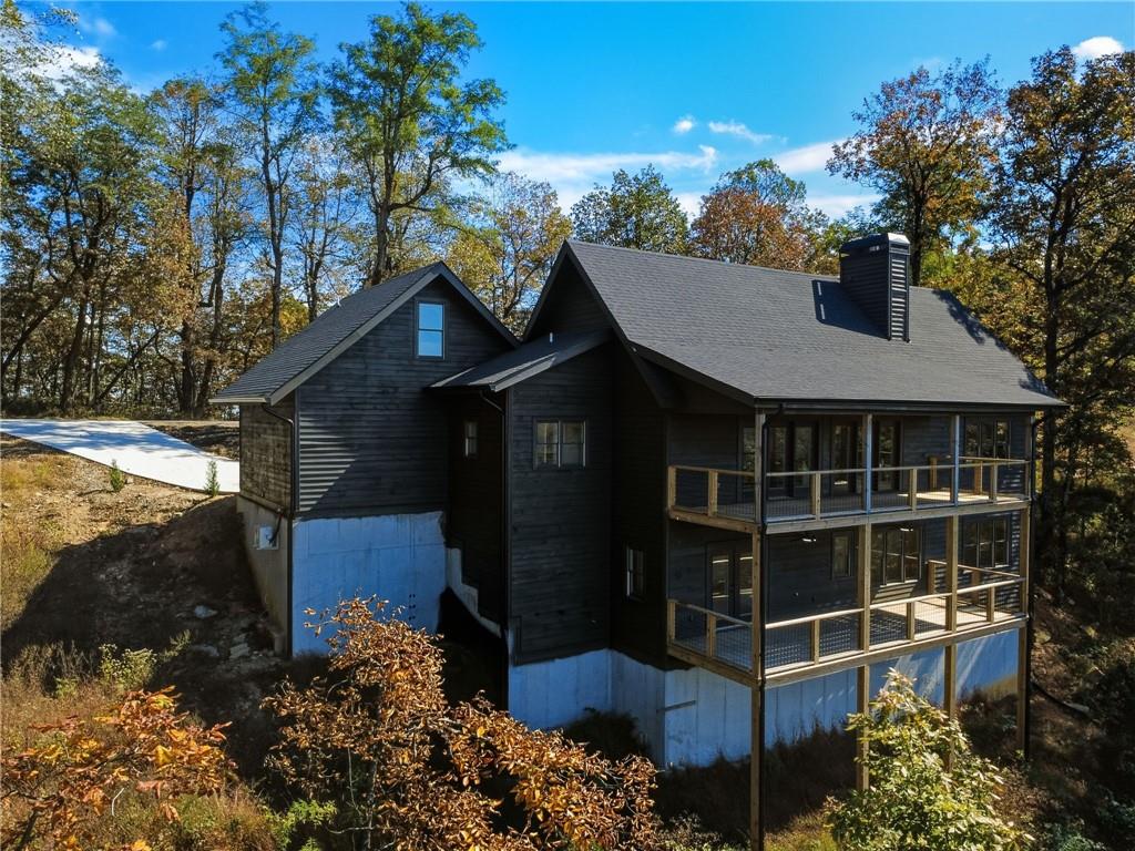 5388 Monument Road Jasper, GA 30143 - Photo 35 of 45 a front view of a house with a yard
