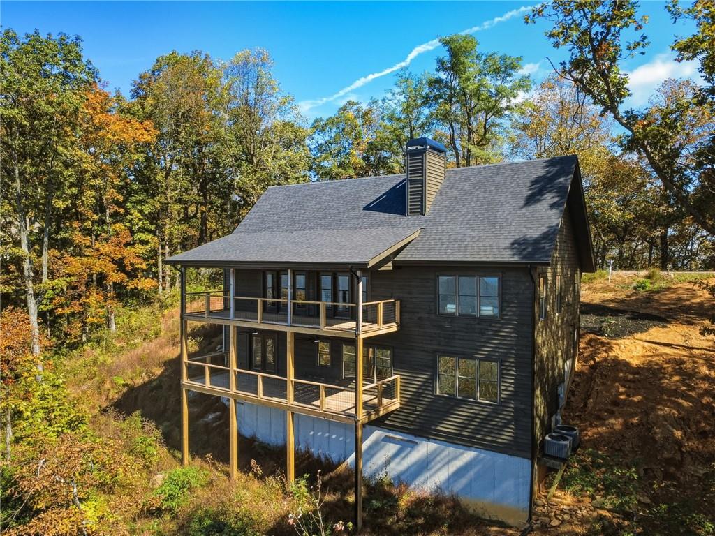 5388 Monument Road Jasper, GA 30143 - Photo 36 of 45 a front view of a house with a yard