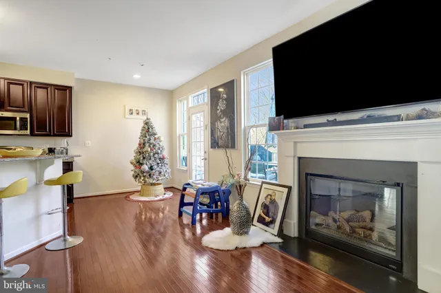 a kitchen with stainless steel appliances granite countertop a stove and a microwave