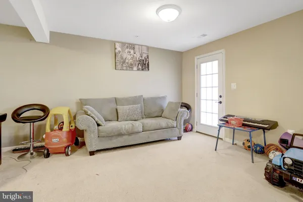 a living room with furniture and a couch