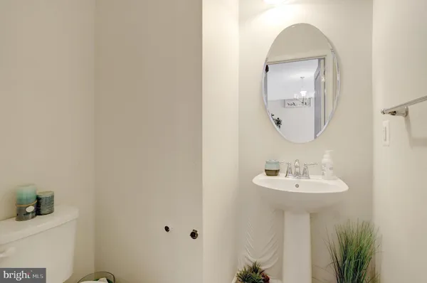 a view of a hallway with a furniture