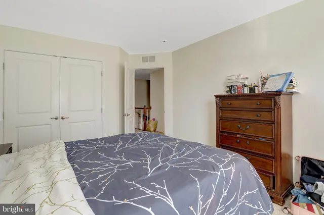 a room with a bed and a window